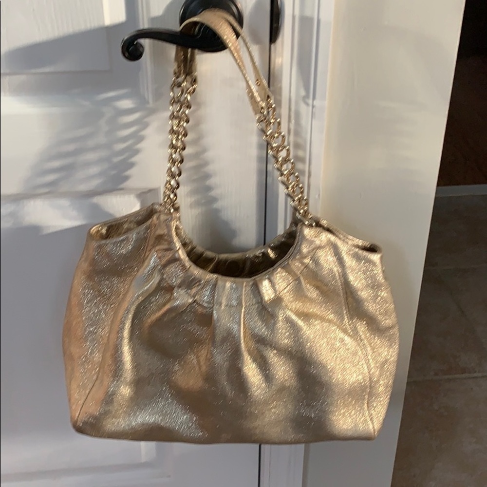 Kate Spade hand bag gold glimmer
